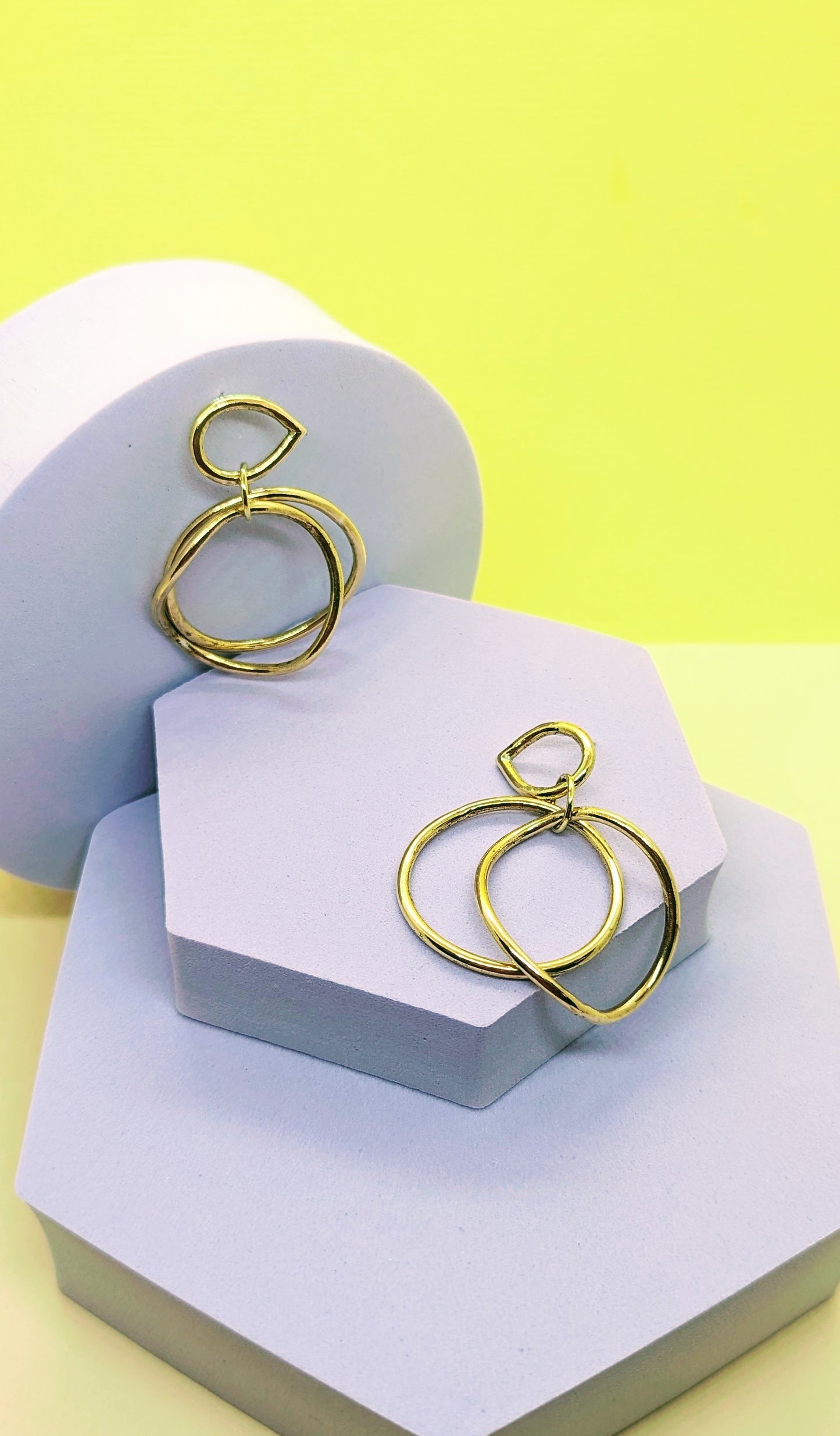 Gold Statement Earrings on display