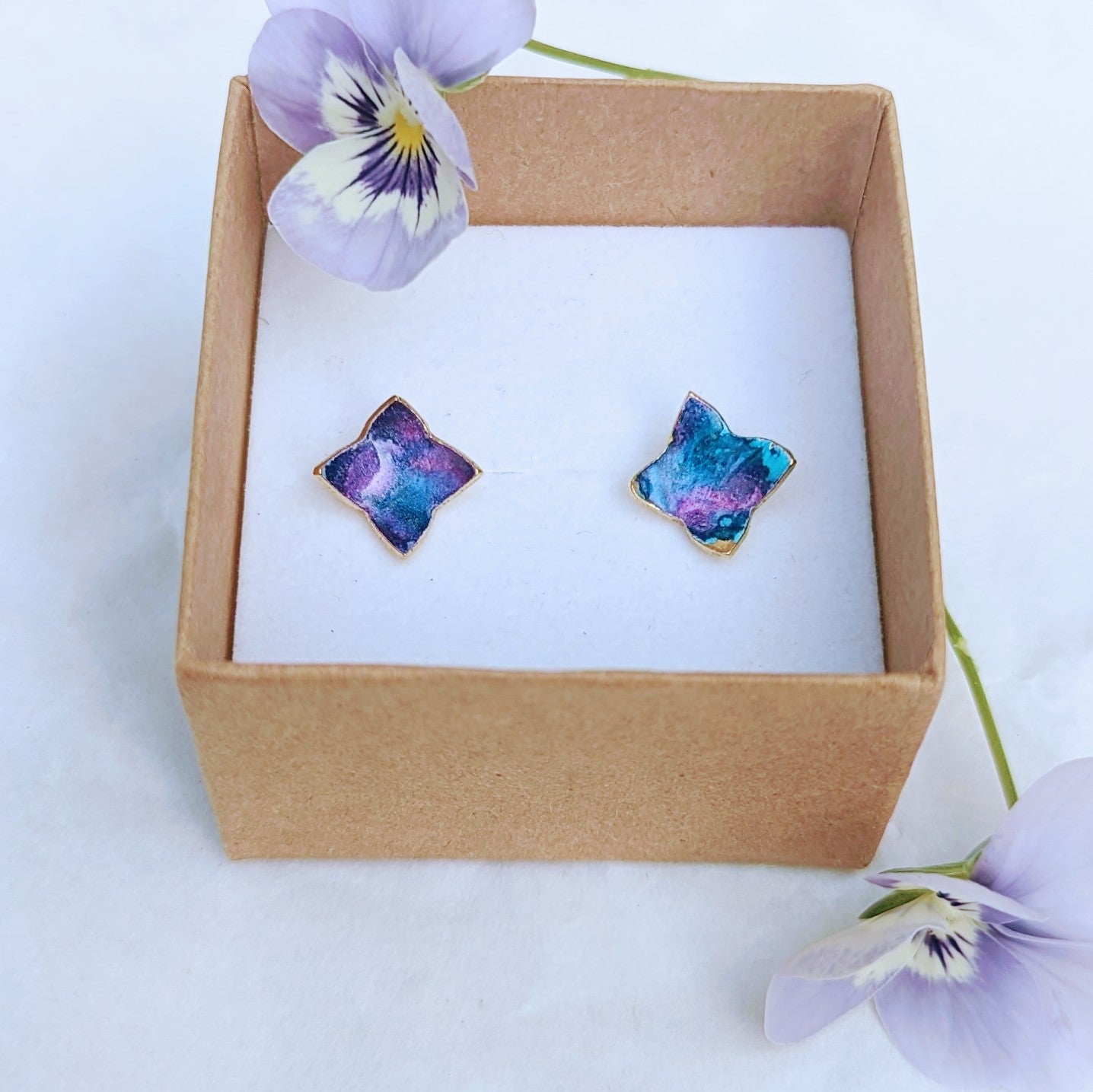 'Theia's Garden' Blue Star Floral Stud Earrings. Earrings displayed in Jewellery box