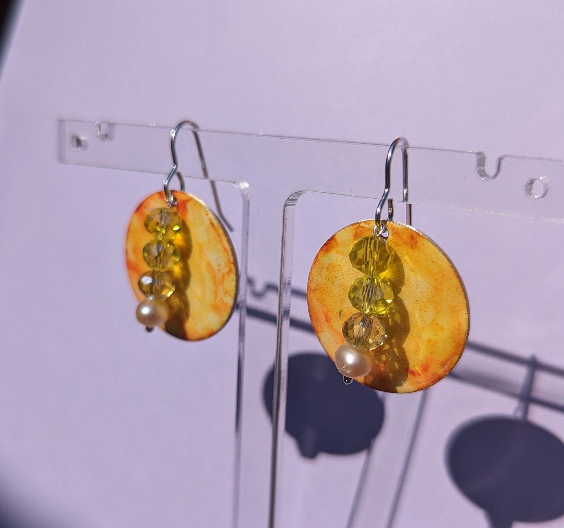 Warm yellow earrings and sparkling crystals 