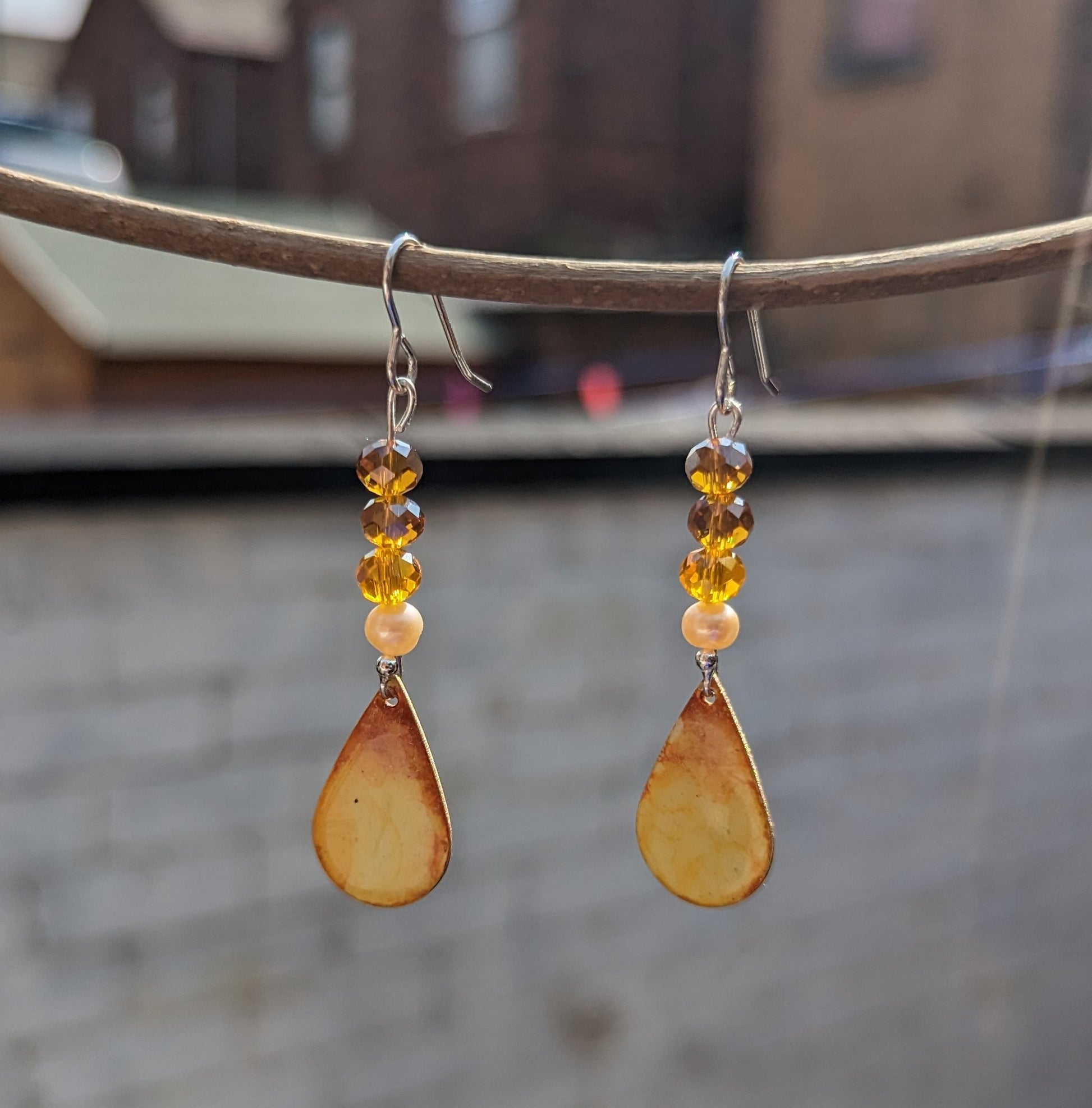 Warm yellow earrings and sparkling crystals 