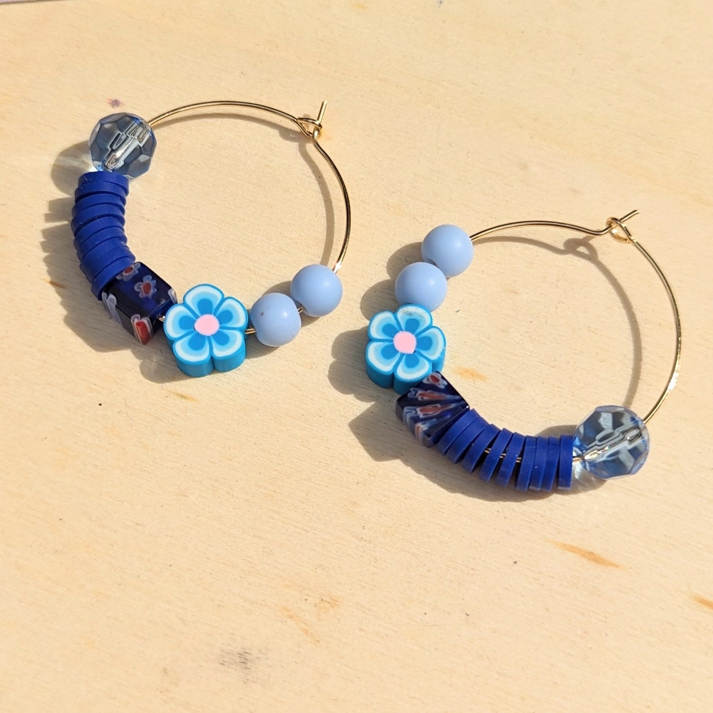 Azure Beaded flower Hoops.