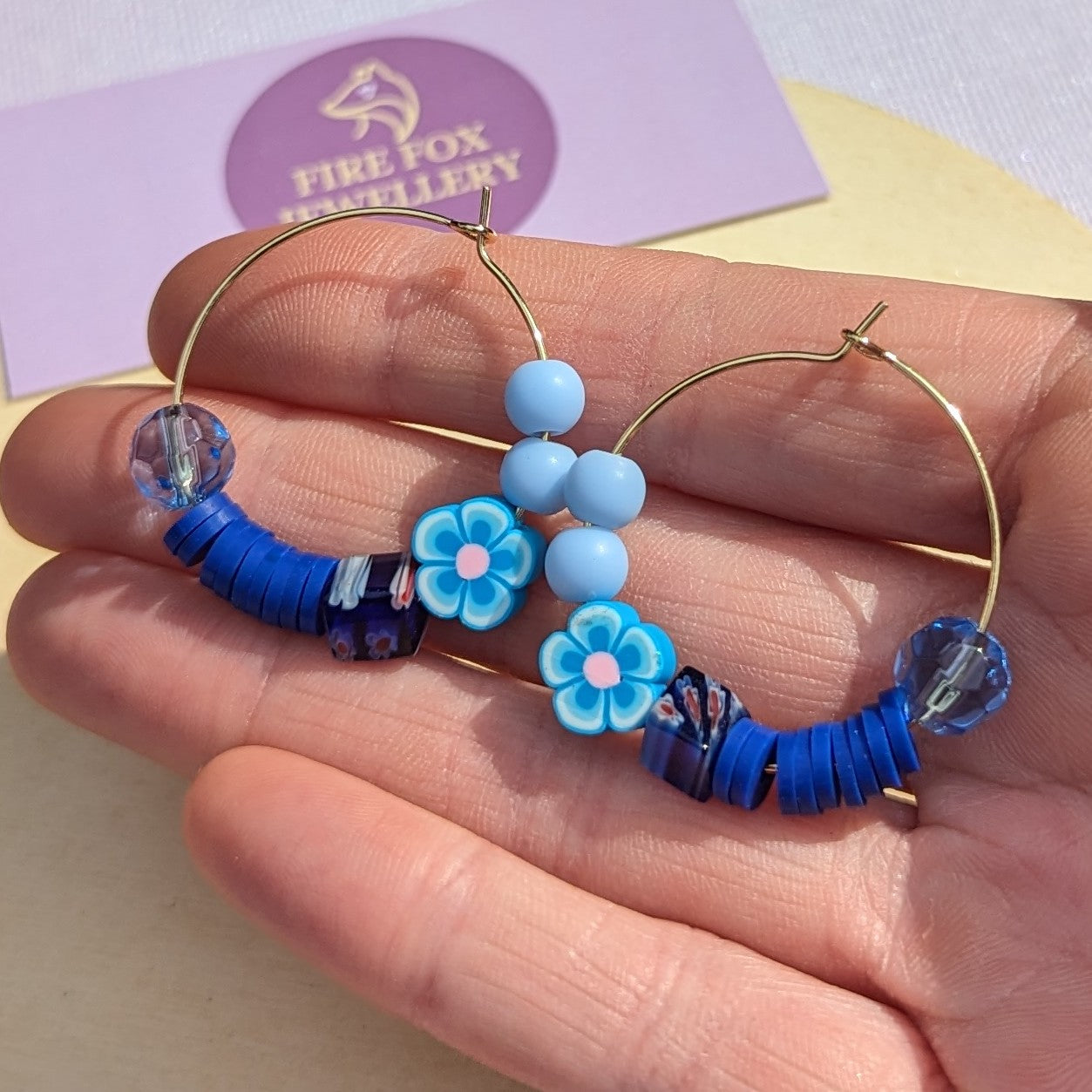 Azure Beaded flower Hoops.