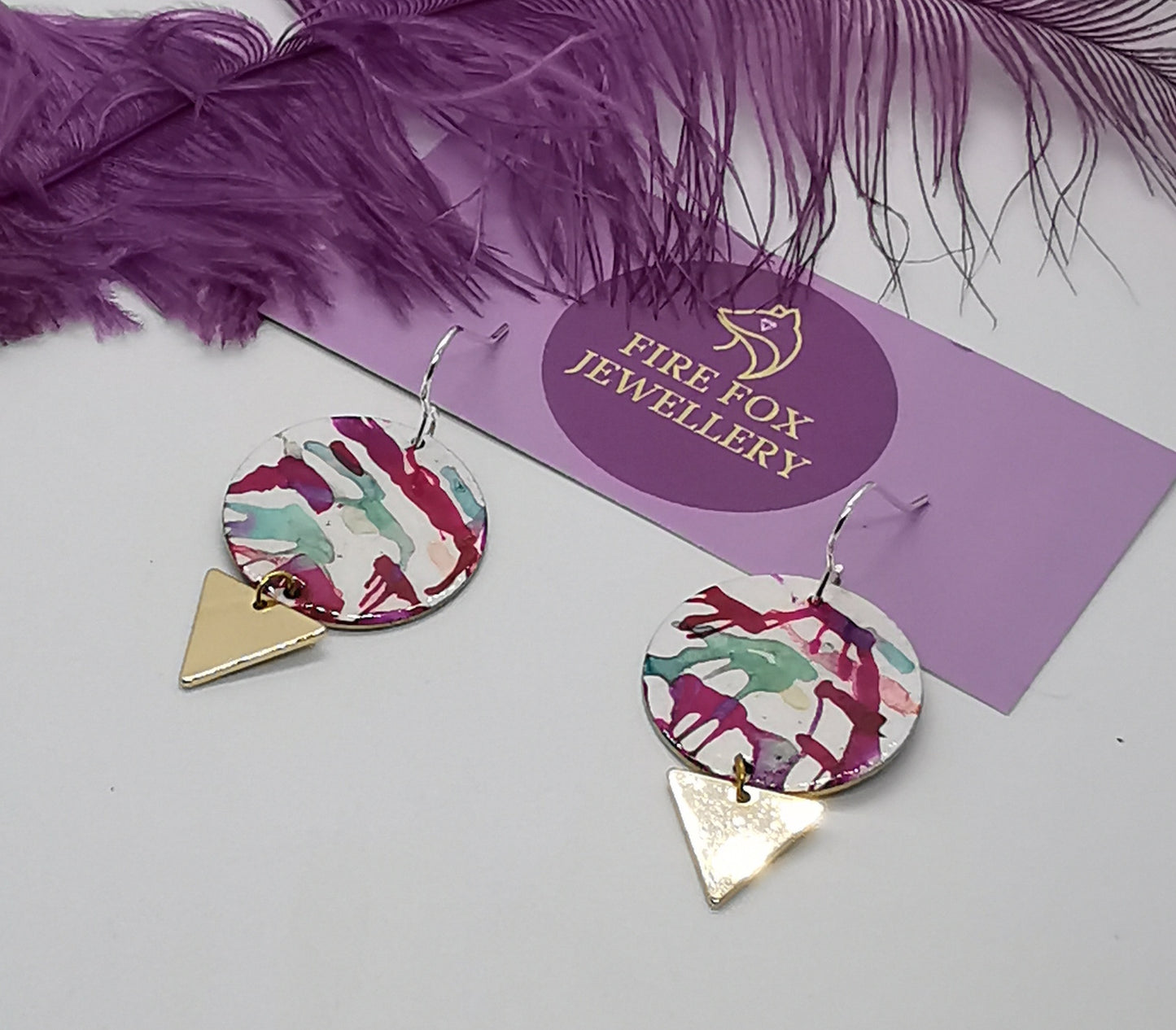 Sweet Plum, Hot Pink and Forget-Me-Not Blue Earings with gold plated triangle charms. spring and summer jewellery trends 